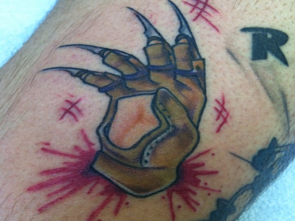 Nice Cartoon Freddy Krueger Glove Tattoo