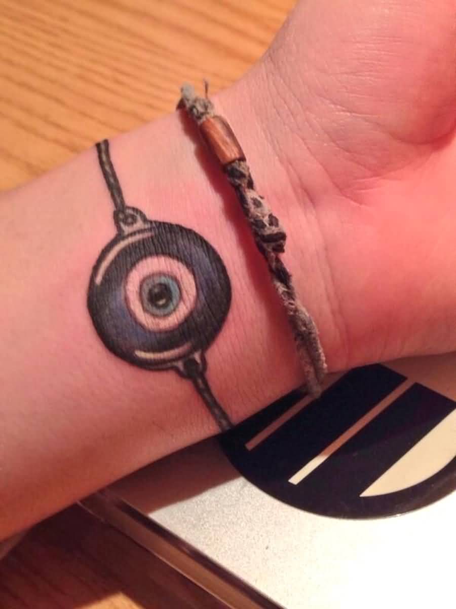 Nice Evil Eye Armband Tattoo On Wrist
