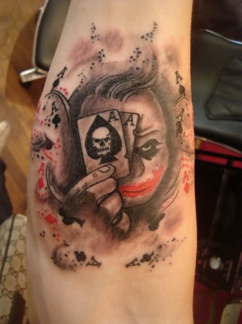Nice Evil Joker With Cards Tattoo On Forearm
