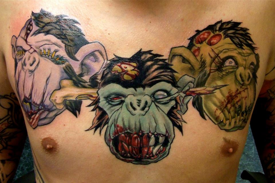 Nice Evil Monkeys Head Tattoo On Chest By Cheape