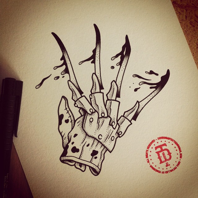 Nice Freddy Krueger Glove With Blood Tattoo Design