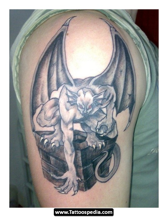 Nice Grey Colored Evil Having Wings Tattoo On Right Shoulder