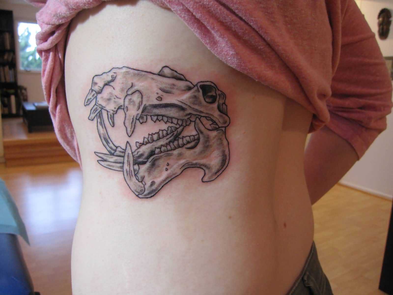 Nice Grey Ink Hippo Skull Tattoo On Side Rib
