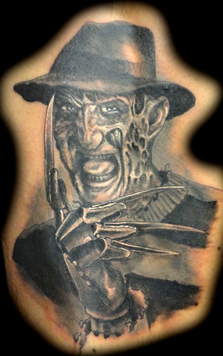 Nice Grey Ink Smiling Freddy Krueger Tattoo Design