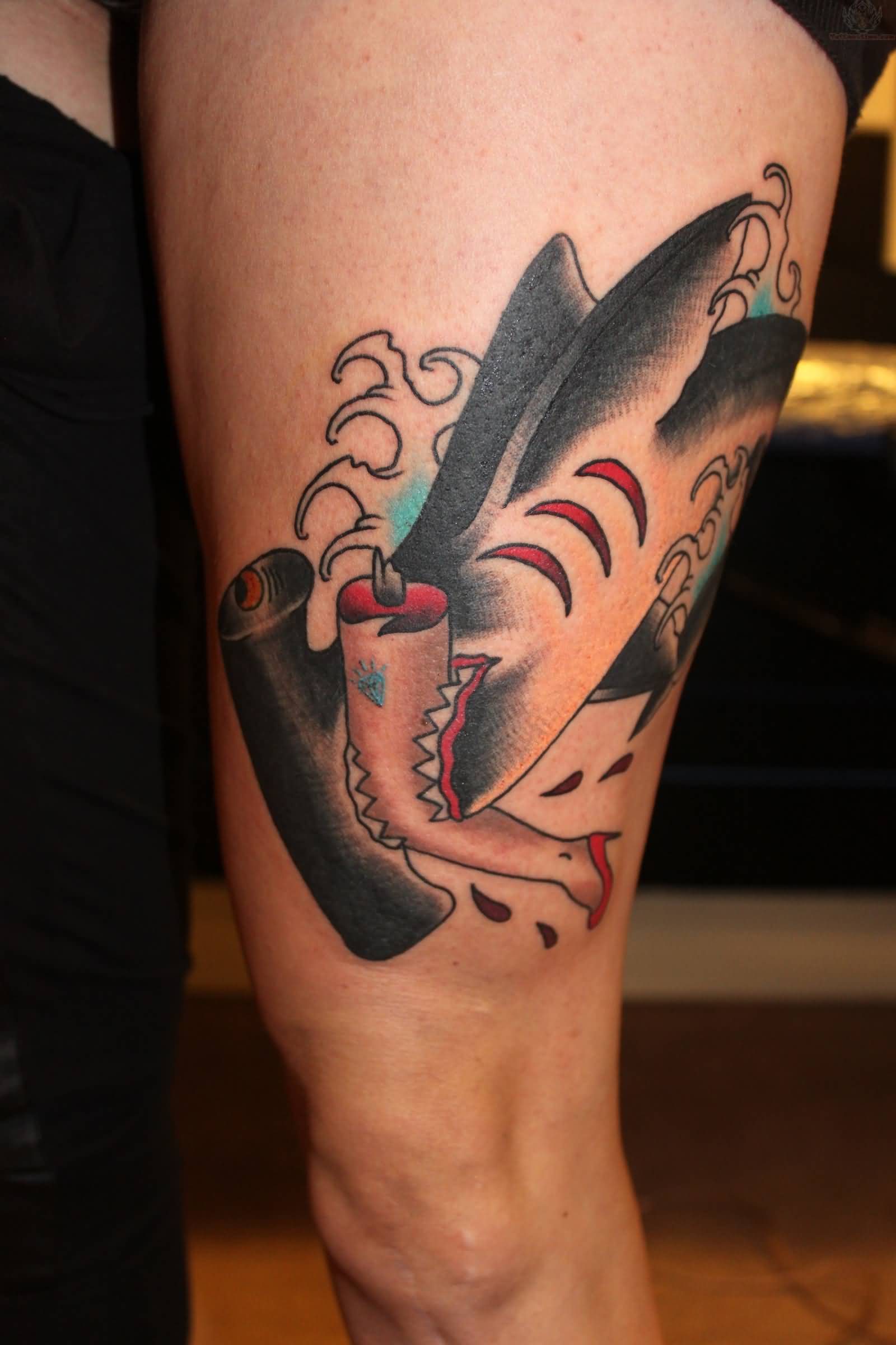 Nice Hammerhead Shark Eating Leg Traditional Tattoo On Thigh