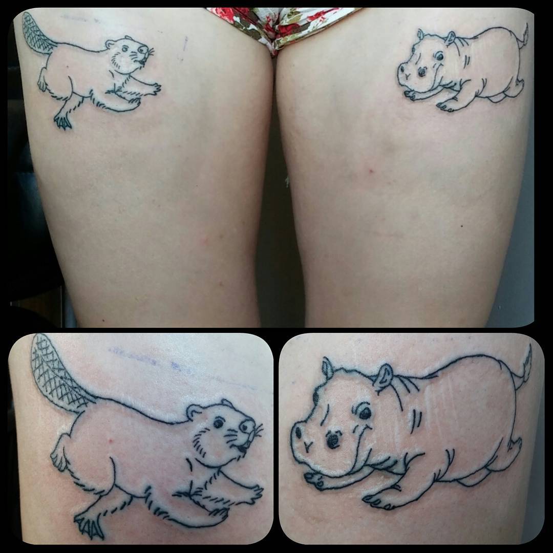 Nice Hippo And Beaver Tattoo On Both Thigh