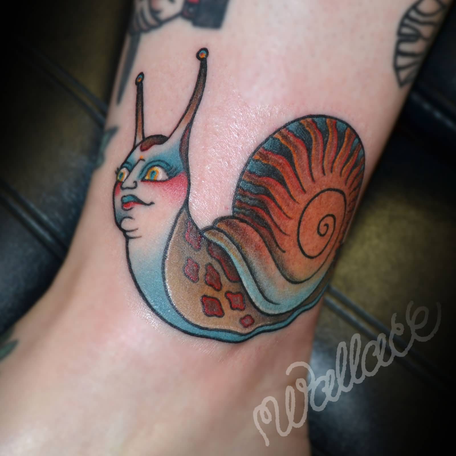 Nice Lady Snail Traditional Tattoo On Ankle