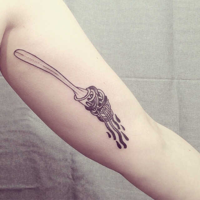 Nice Light Grey Fork With Spaghetti Tattoo Design On Bicep