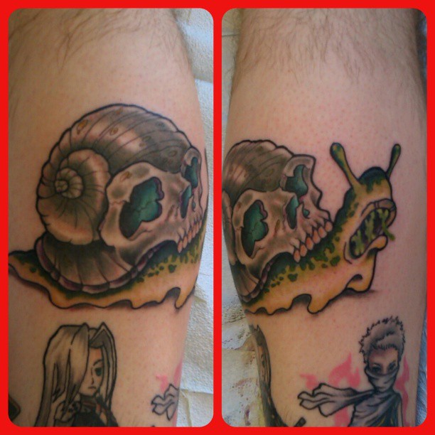 Nice Skull Shell On Snail Back Tattoo