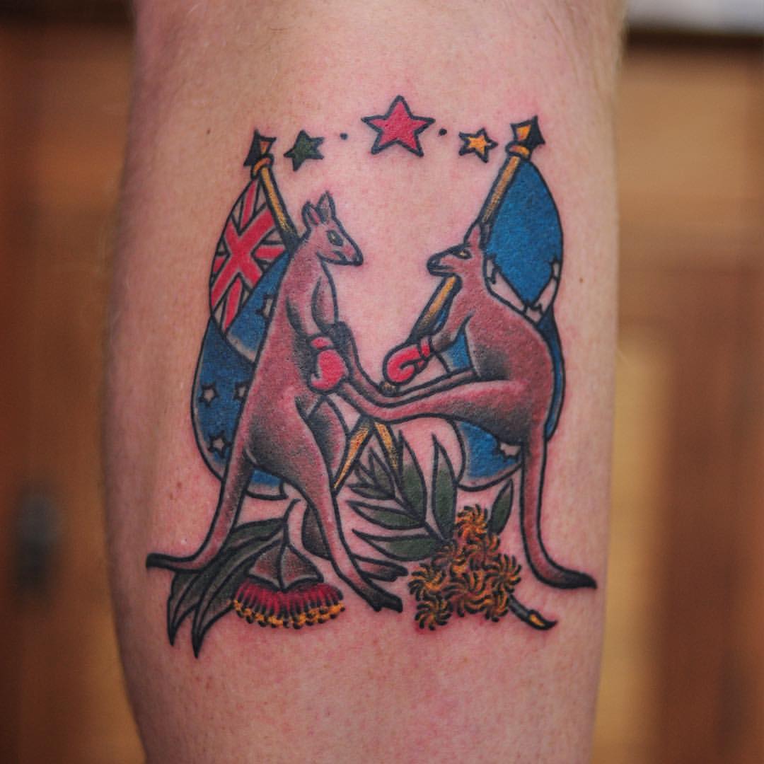 Nice Two Boxer Kangaroos Holding Australian Flags Traditional Tattoo By Mark Lording