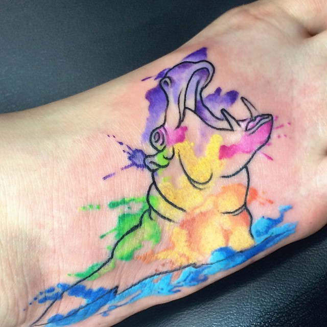 Nice Watercolor Crying Hippo Tattoo On Foot