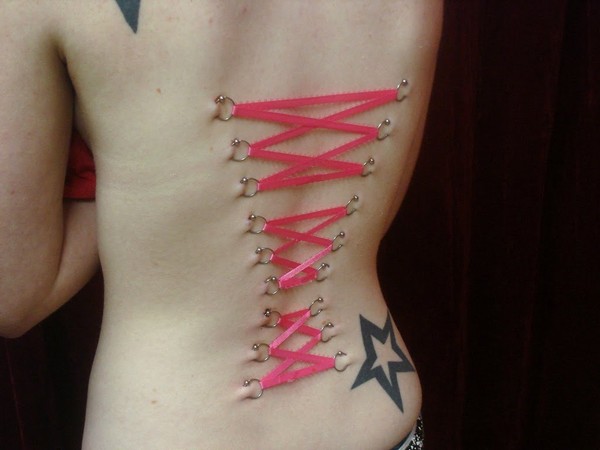 Pink Ribbon Corset Piercing On Back Body