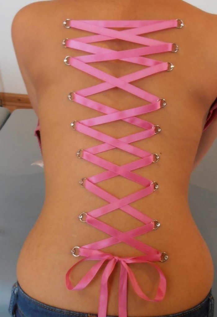 Pink Ribbon Corset Piercing On Full Back.