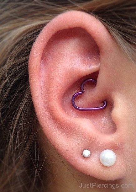 Purple Heart Ring Daith Piercing On Girl Right Ear