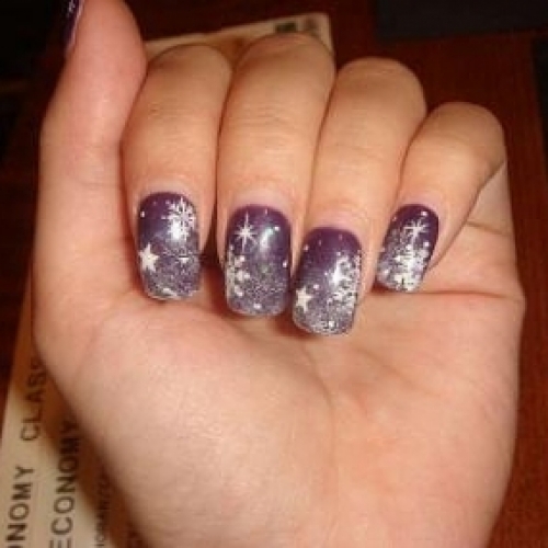 Purple Nails With White Snowflakes And Stars Design Winter Nail Art