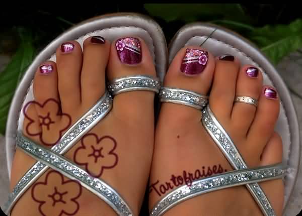 Purple Toe Nail Art With White Flowers Design Idea