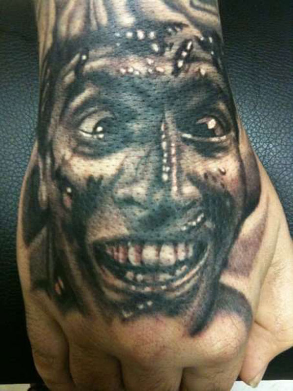 Realistic Ash Of Evil Dead Tattoo On Hand