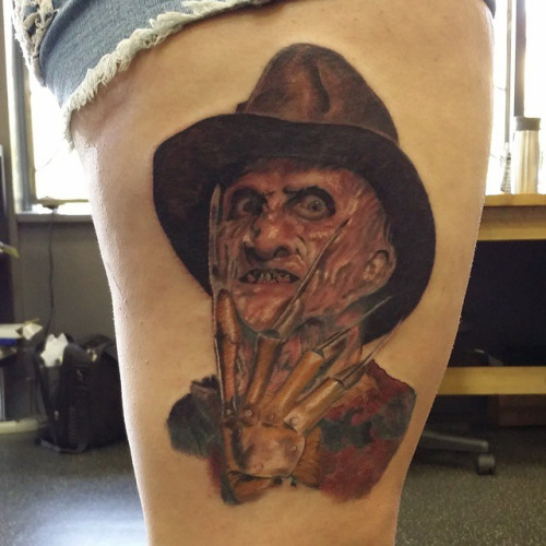 Realistic Color Angry Freddy Krueger Portrait Tattoo On Thigh