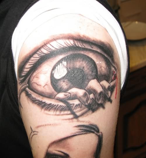 Realistic Colored 3D Hand Coming Out Of Eye Evil Tattoo