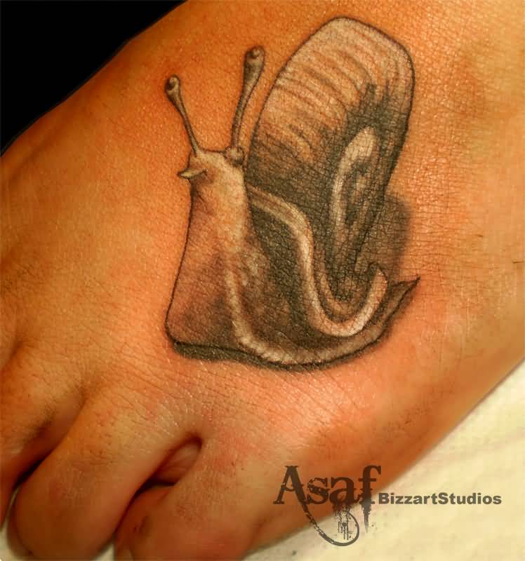 Realistic Colored Cute Snail Tattoo On Hand