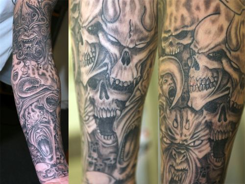 Realistic Colored Evil Demons Skulls Tattoo On Full Sleeve