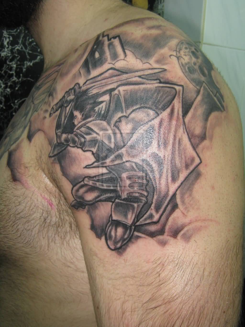 Realistic Evil Tattoo On Left Upper Shoulder