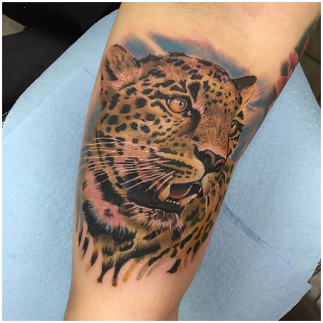 Realistic Jaguar Face Tattoo On Forearm