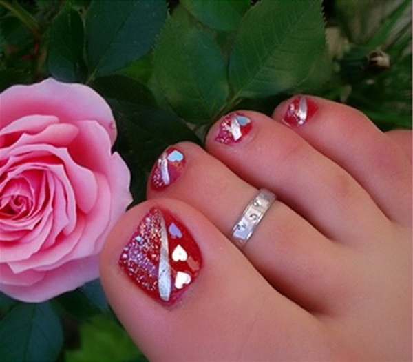 Red Nails With Metallic Heart And Stripes Toe Nail Art