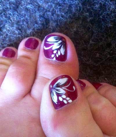 Red Nails With White Flowers Toe Nail Art