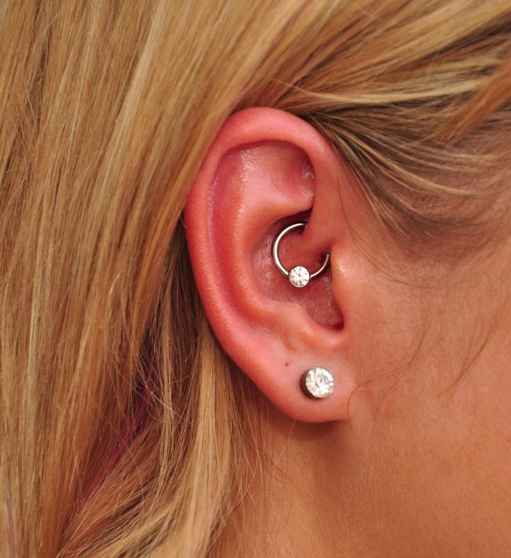 Right Ear Lobe And Daith Piercing With Diamond Ring