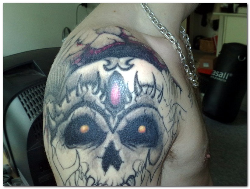 Scary Evil Skull Tattoo On Right Shoulder