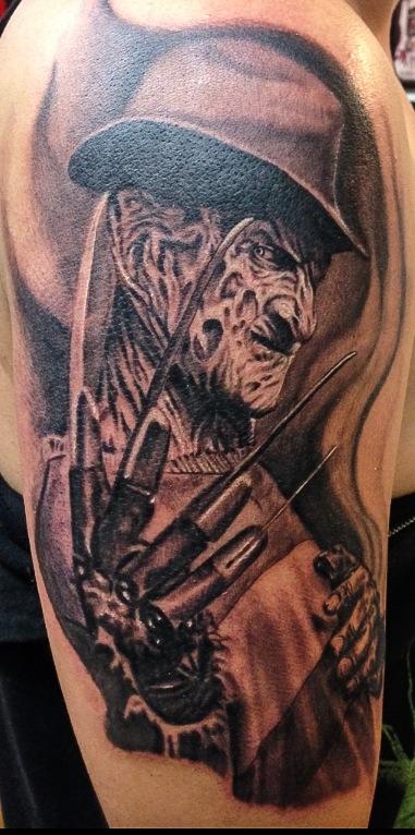Scary Grey And Black Freddy Krueger Tattoo On Right Half Sleeve By Cesar perez