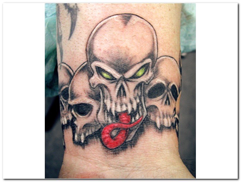 Scary Grey Colored Evil Skulls Tattoo