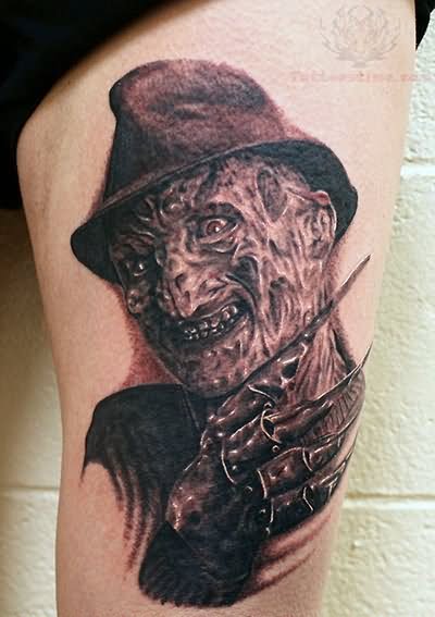 Scary Grey Ink Freddy Krueger Head Tattoo On Leg