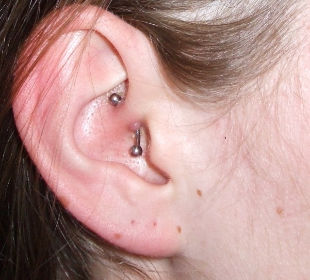 Silver Curved Barbell Daith Piercing On Right Ear