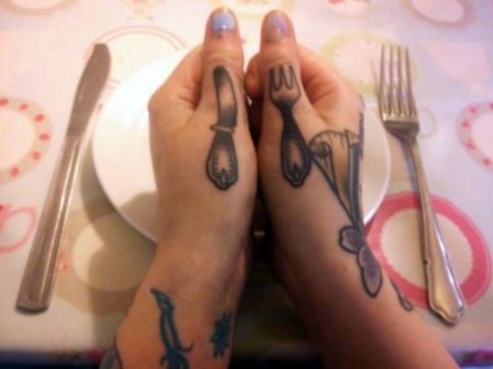 Small Black And Grey Fork And Knife Matching Tattoo On Both Thumbs