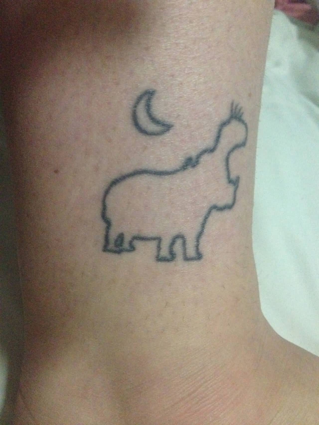 Small Hippo With Half Moon Outline Tattoo On Ankle