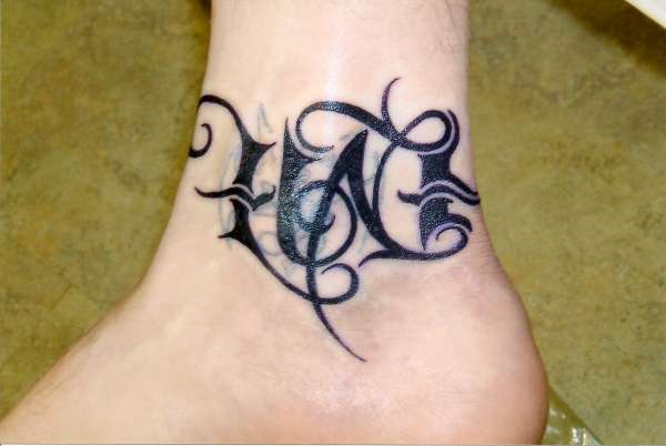 Small Love Evil Word Tattoo On Ankle