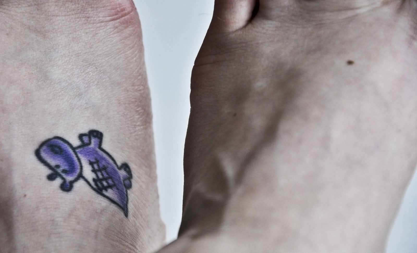 Smallest Purple Cute Hippo Tattoo On Foot