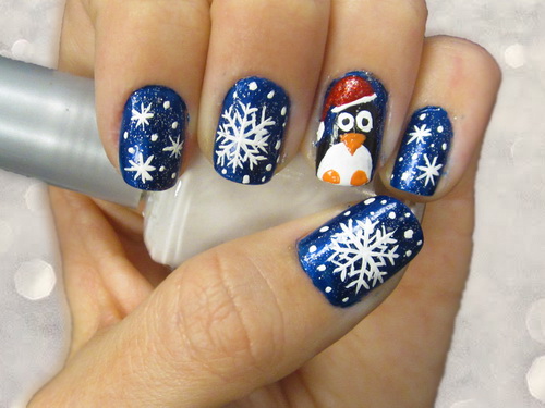 Snowflakes And Penguin Design Winter Nail Art