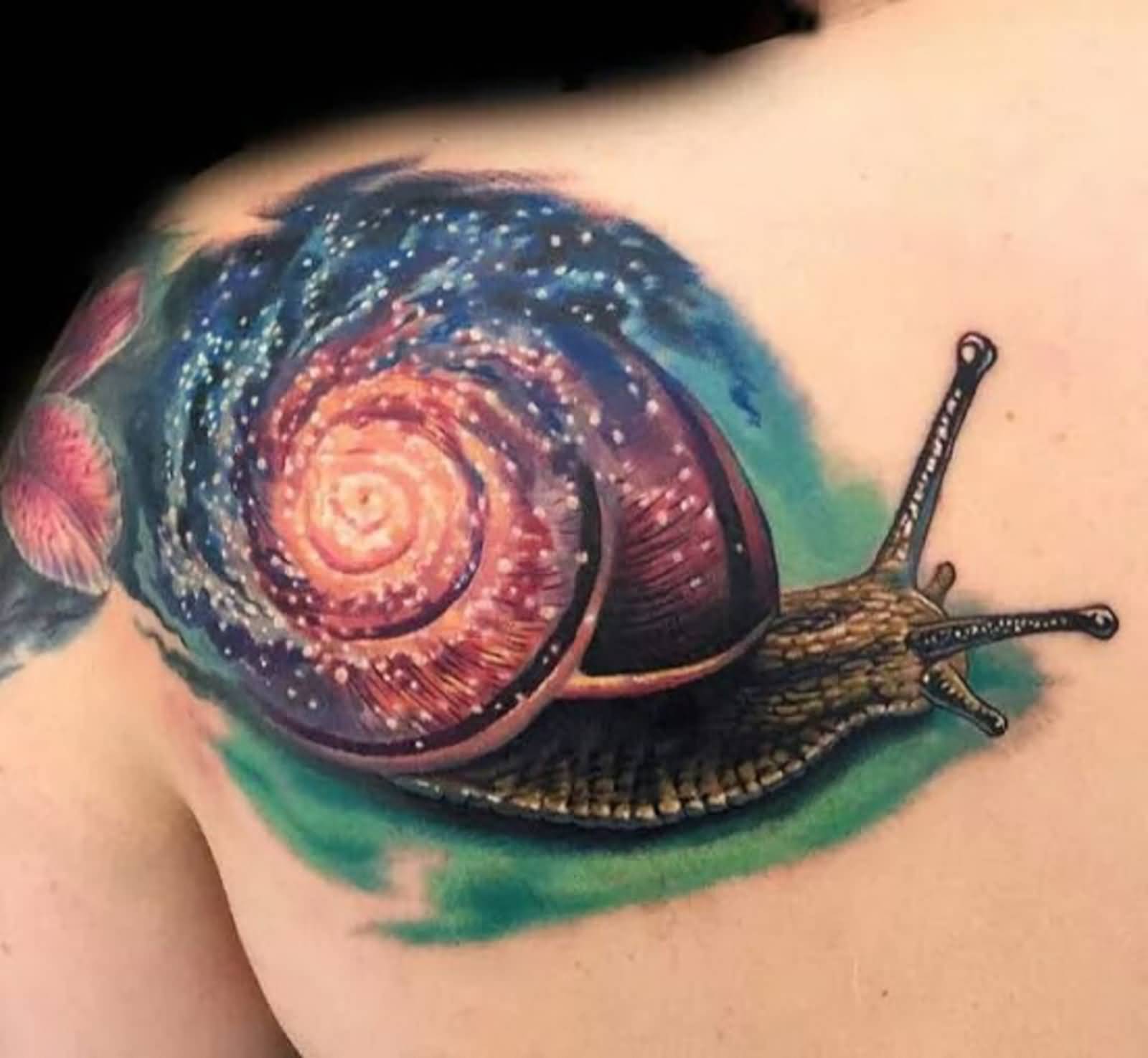 Spectactular Snail With Galaxy Tattoo On Left Back Shoulder