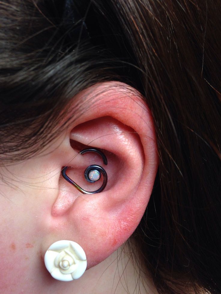 Spiral Heart Ring Daith Piercing On Girl Left Ear