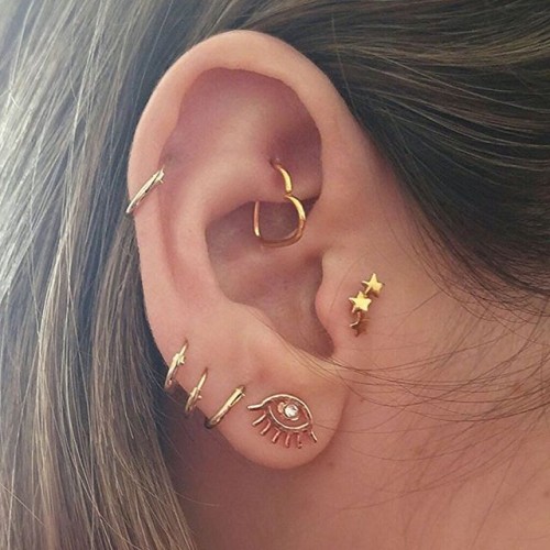 Spiral Lobe And Daith Piercing For Young Girls