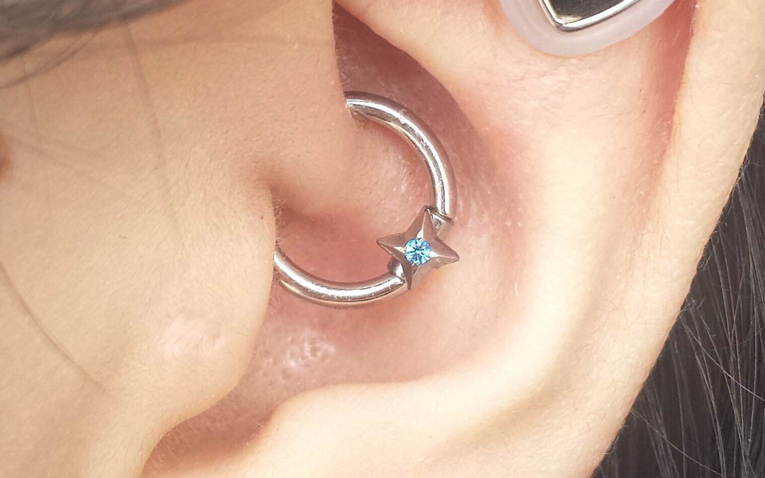 Star Ring Daith Piercing Closeup Image