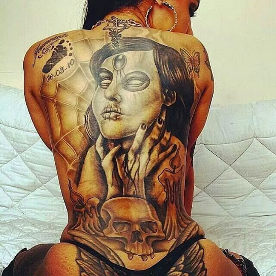 Stunning Large Evil Lady With Skull And Spider Web Tattoo On Full Back