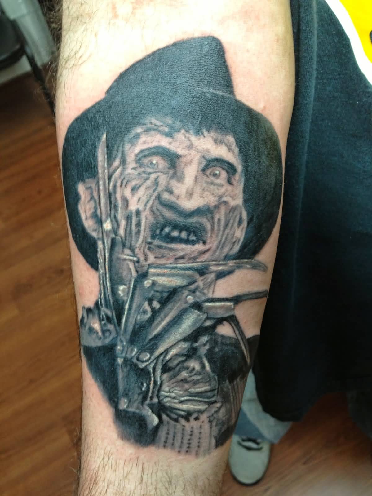 Superb Grey Ink Freddy Krueger Tattoo On Half Sleeve
