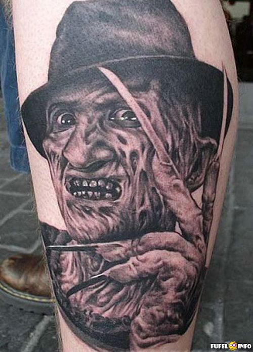 Terrific Grey Ink Freddy Tattoo On Leg