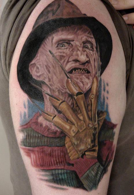 Terrific Large Freddy Krueger Colored Tattoo On Left Half Sleeve