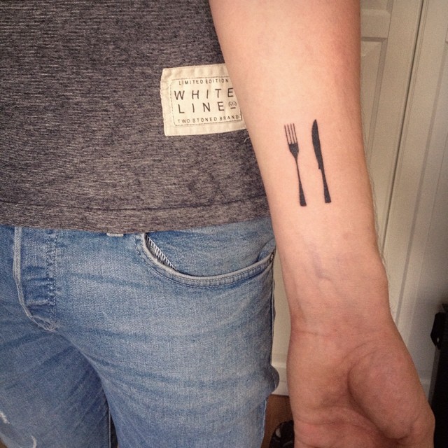 Tiny Knife With Fork Silhouette Tattoo On Forearm