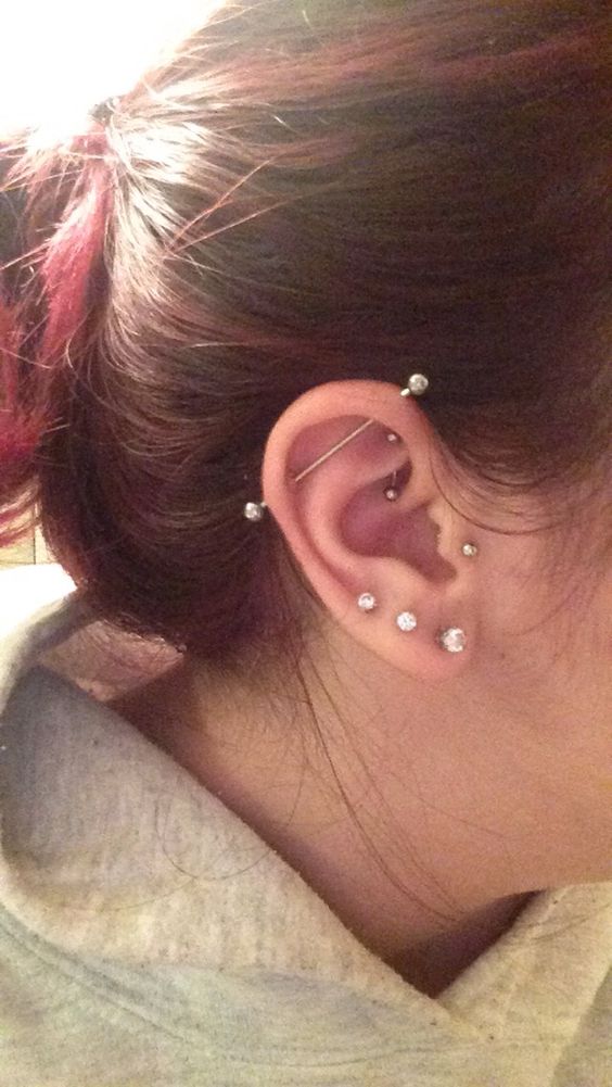 Triple Ear Lobe And Industrial Piercing Picture
